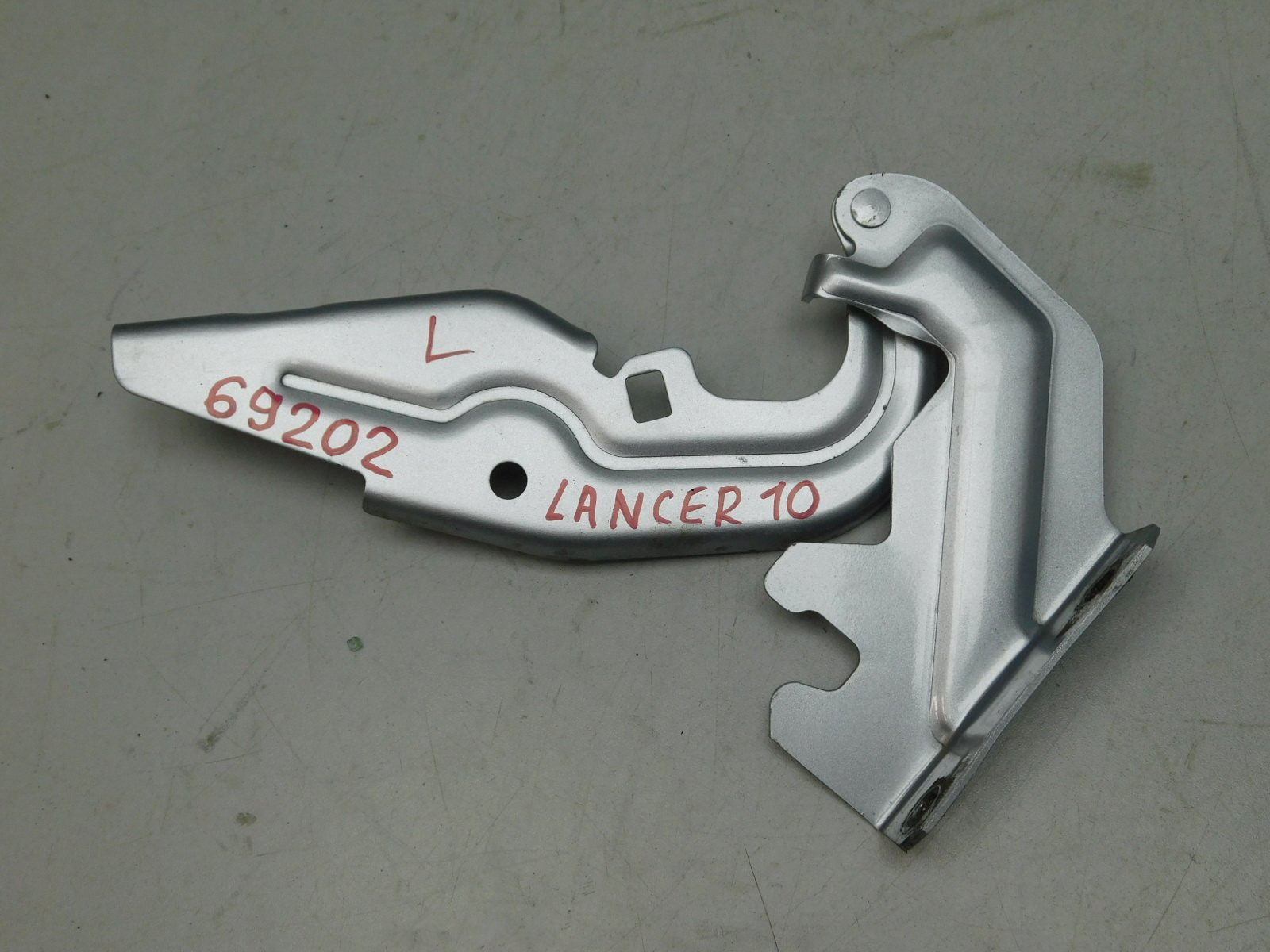 Петля капота левая Mitsubishi Lancer 2007>