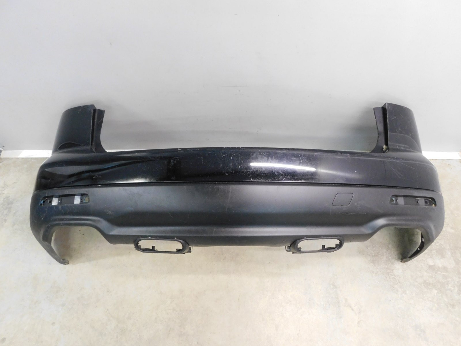 Бампер задний Mazda CX 9 2007>