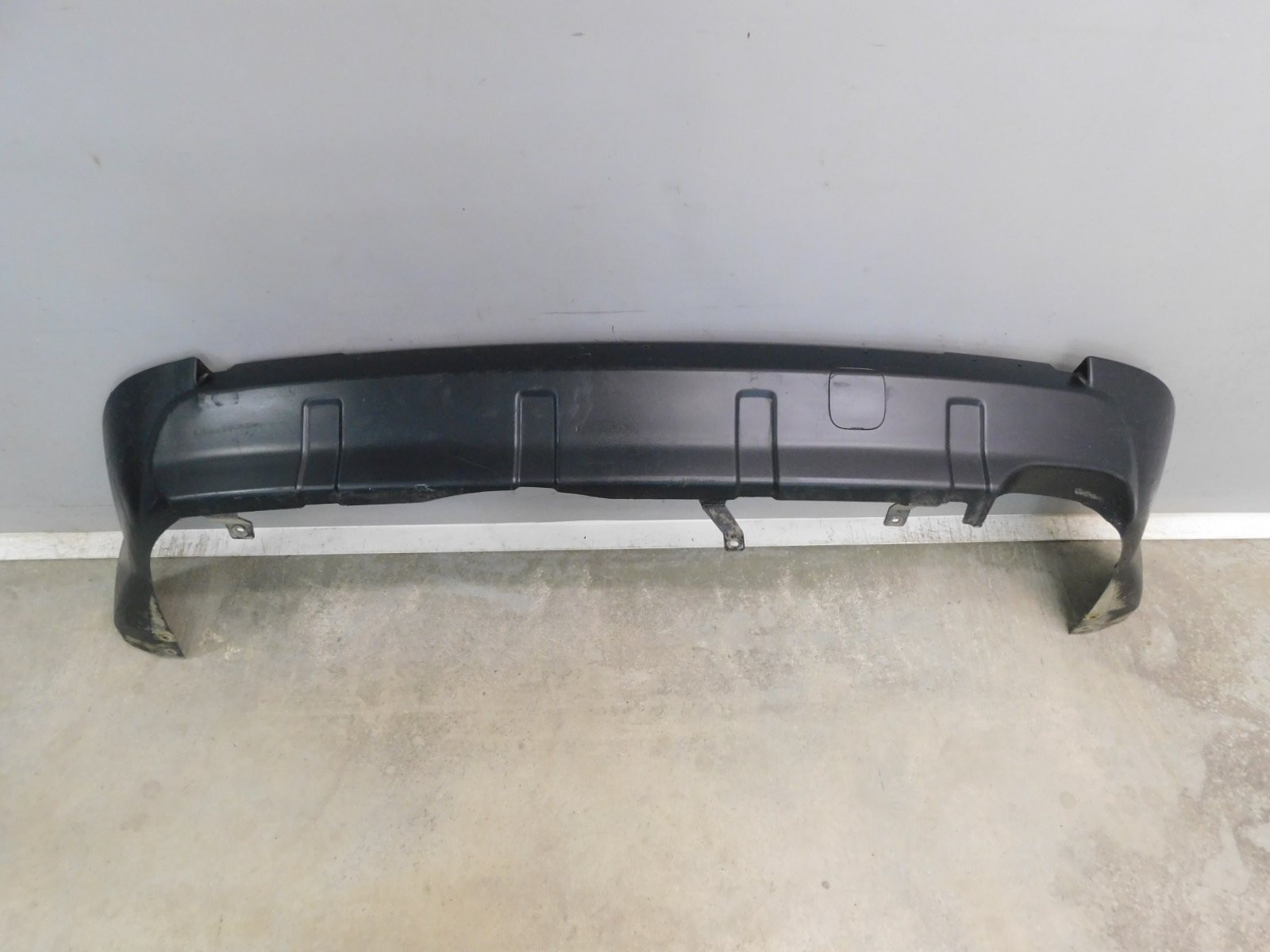 Бампер задний Mitsubishi Outlander XL (CW) 2006-2012