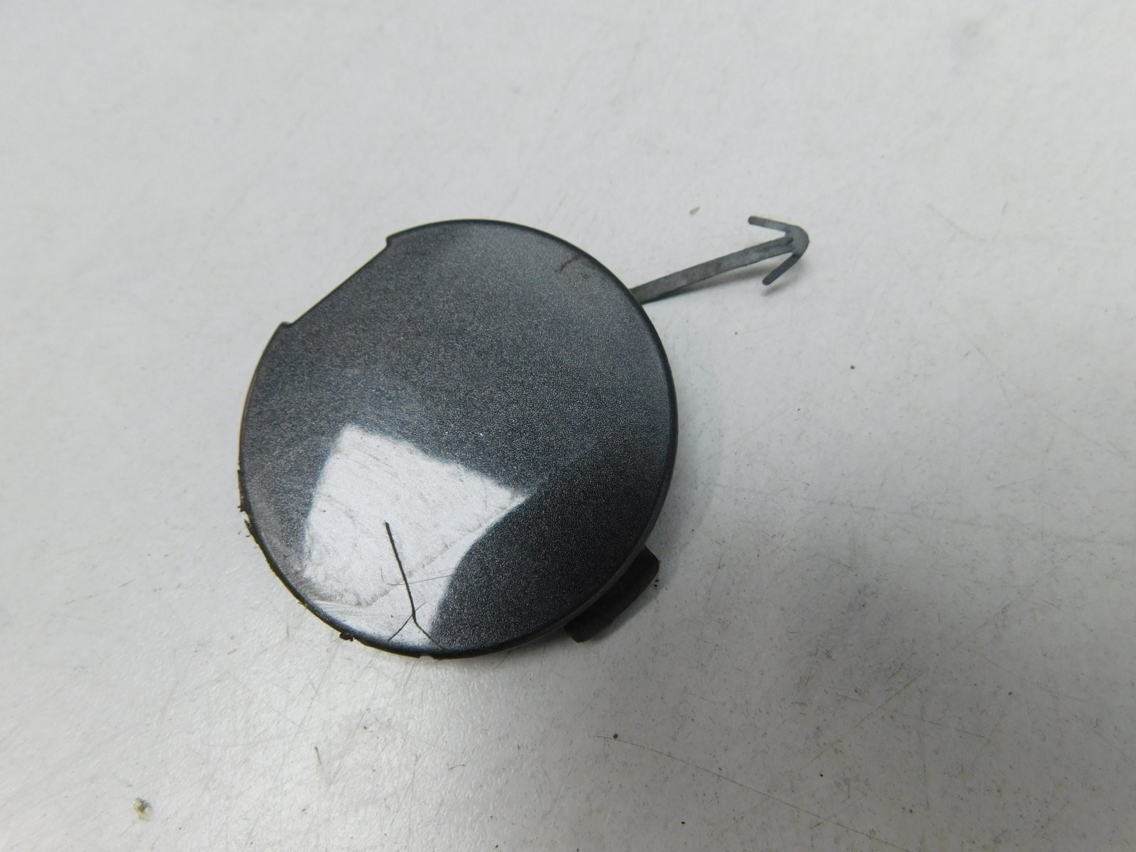 Заглушка буксировочного крюка Mitsubishi Lancer 2007>