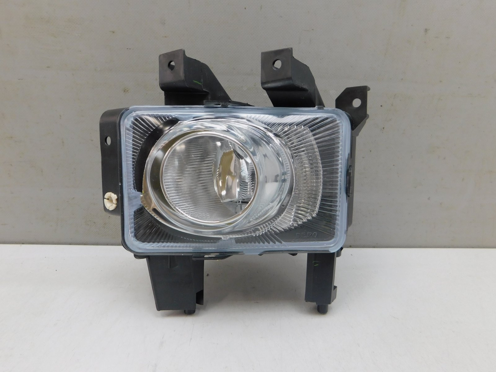 Фара противотуманная левая Opel Astra H 2004>