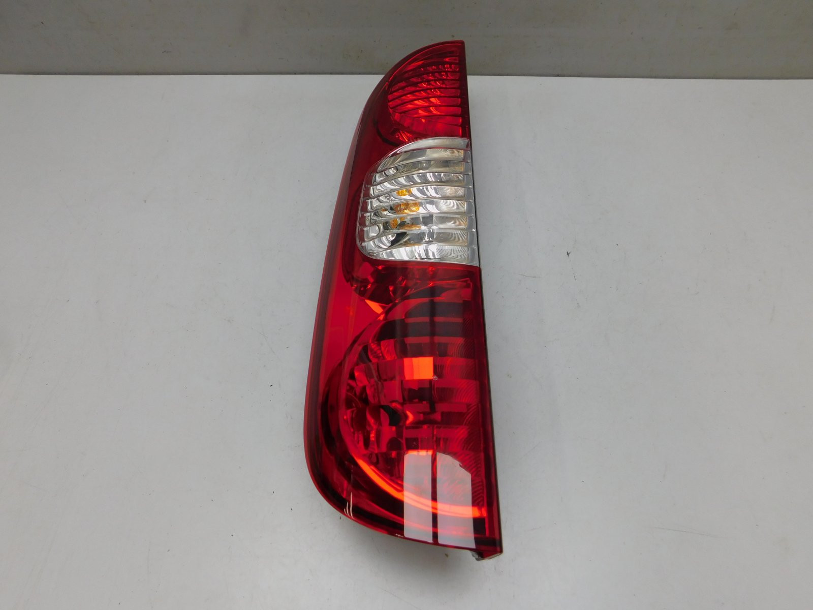 Фонарь задний левый Fiat Doblo 2005>