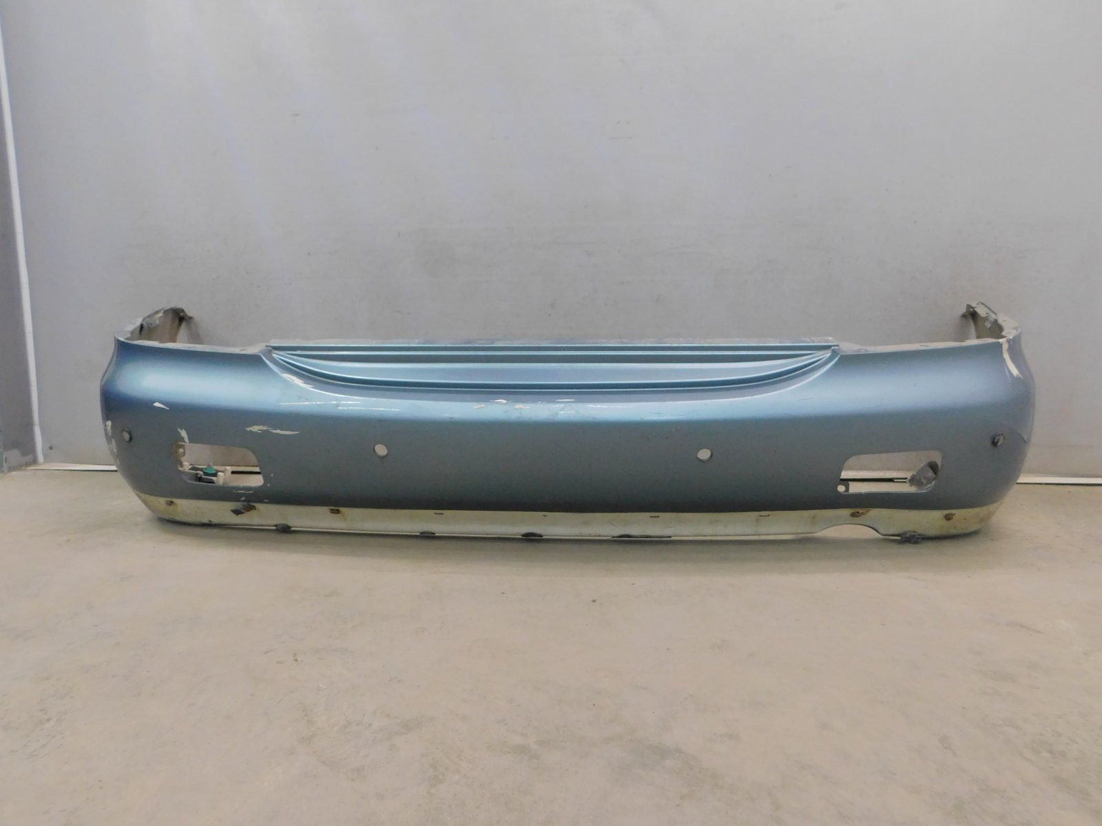 Бампер задний Mitsubishi Lancer (CS) 2003-2006